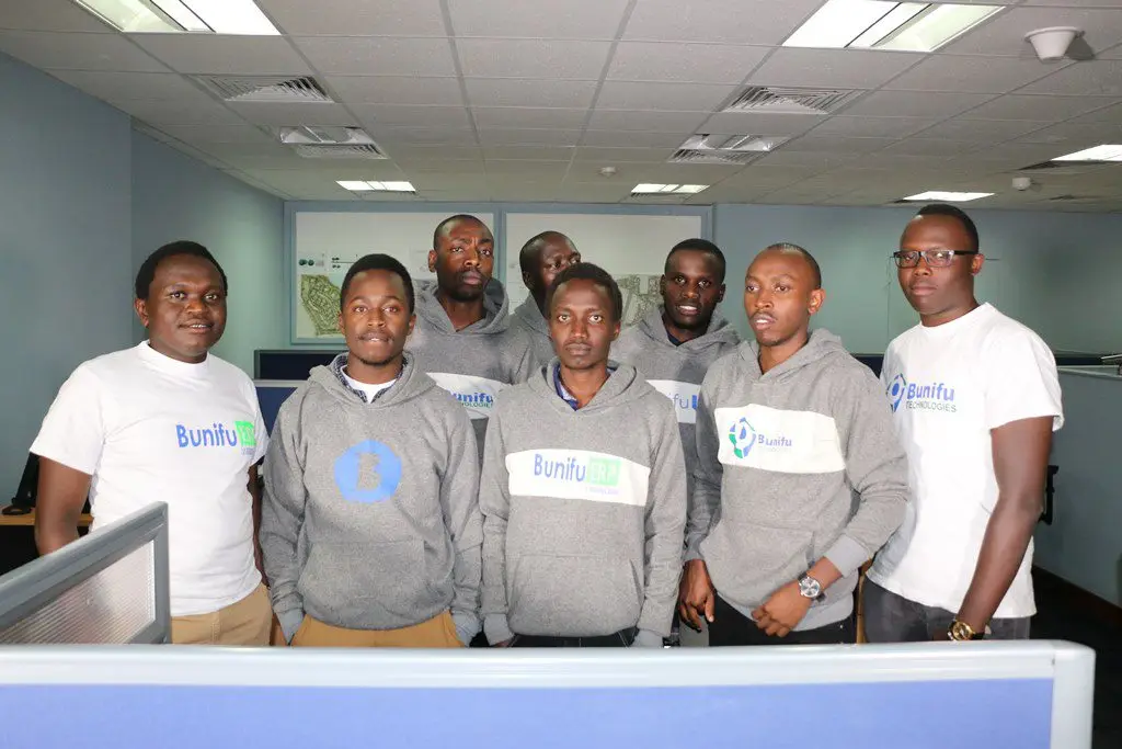 The Bunifu Technologies team standing together in their Nairobi office.